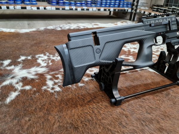 A close-up of the adjustable buttstock on the AGN Technology Uragan 2 700 Carbon 5.5mm.