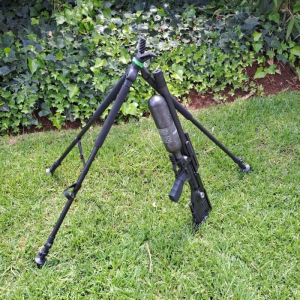 Side view of the Quick Stick Shooting Tripod, with air rifle.